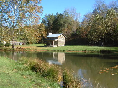 Log House across Pond